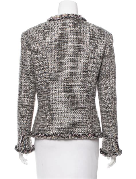 chanel bouclé|Chanel boucle tweed jacket.